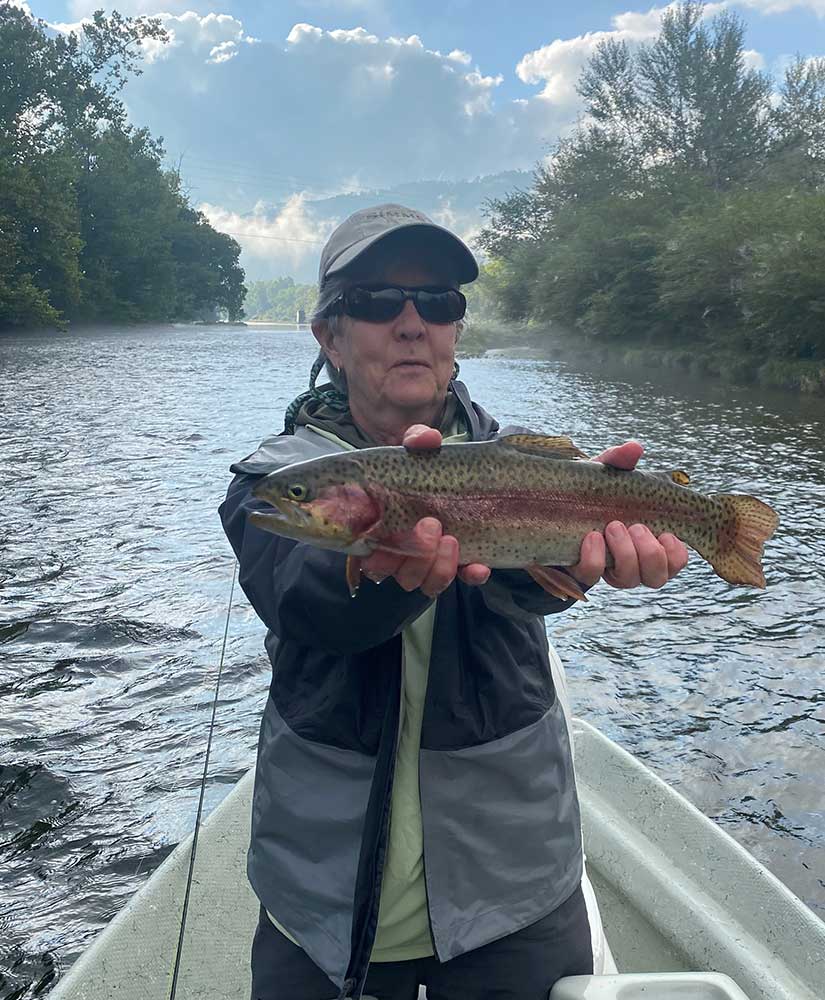 Woman on Watauga River Holding Fish